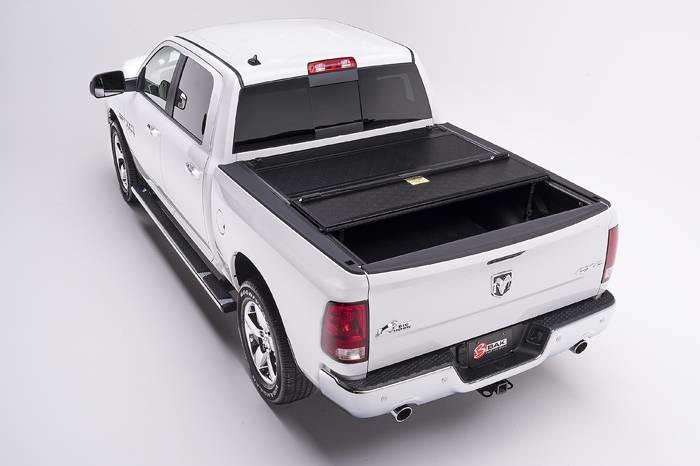 Bak Industries 2009-2017 DODGE RAM 1500 HARD FOLDING TONNEAU COVER (5' 7" BED) | BAKFLIP F1 - 772207RB