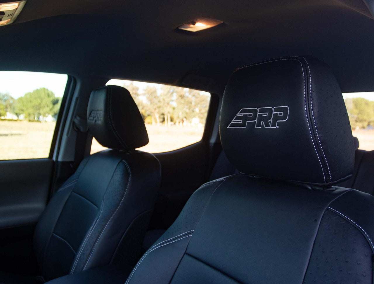 Front Seat Covers for 2016-2023 Toyota Tacoma with Manual Seat Adjusters (Pair) - Black with Red Stitching