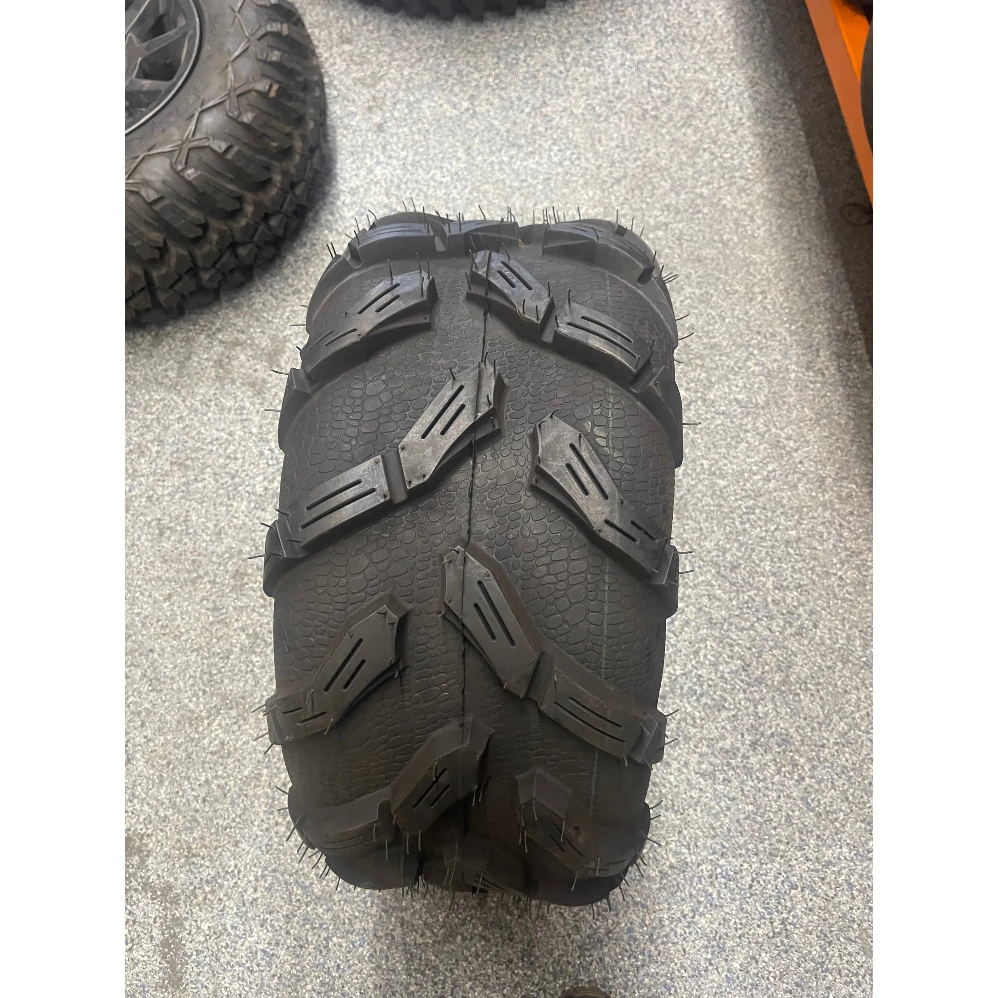 QBT671 Tire 25x10 R12 (GARAGE SALE)
