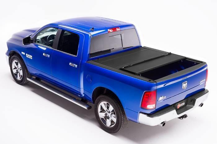 Bak Industries 2009-2017 DODGE RAM 1500 HARD FOLDING TONNEAU COVER (5' 7" BED) | BAKFLIP MX4 - 448207RB