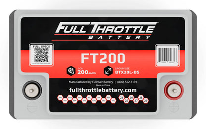 Rectangular Full Throttle battery with FT200 label, featuring black, white, and red design, showing terminals, QR code, and specifications including CCA 200 amps and group size BTX20L-BS.
