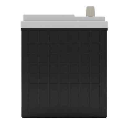 A large black and gray industrial battery with a grid pattern on the front and a protruding terminal on top.