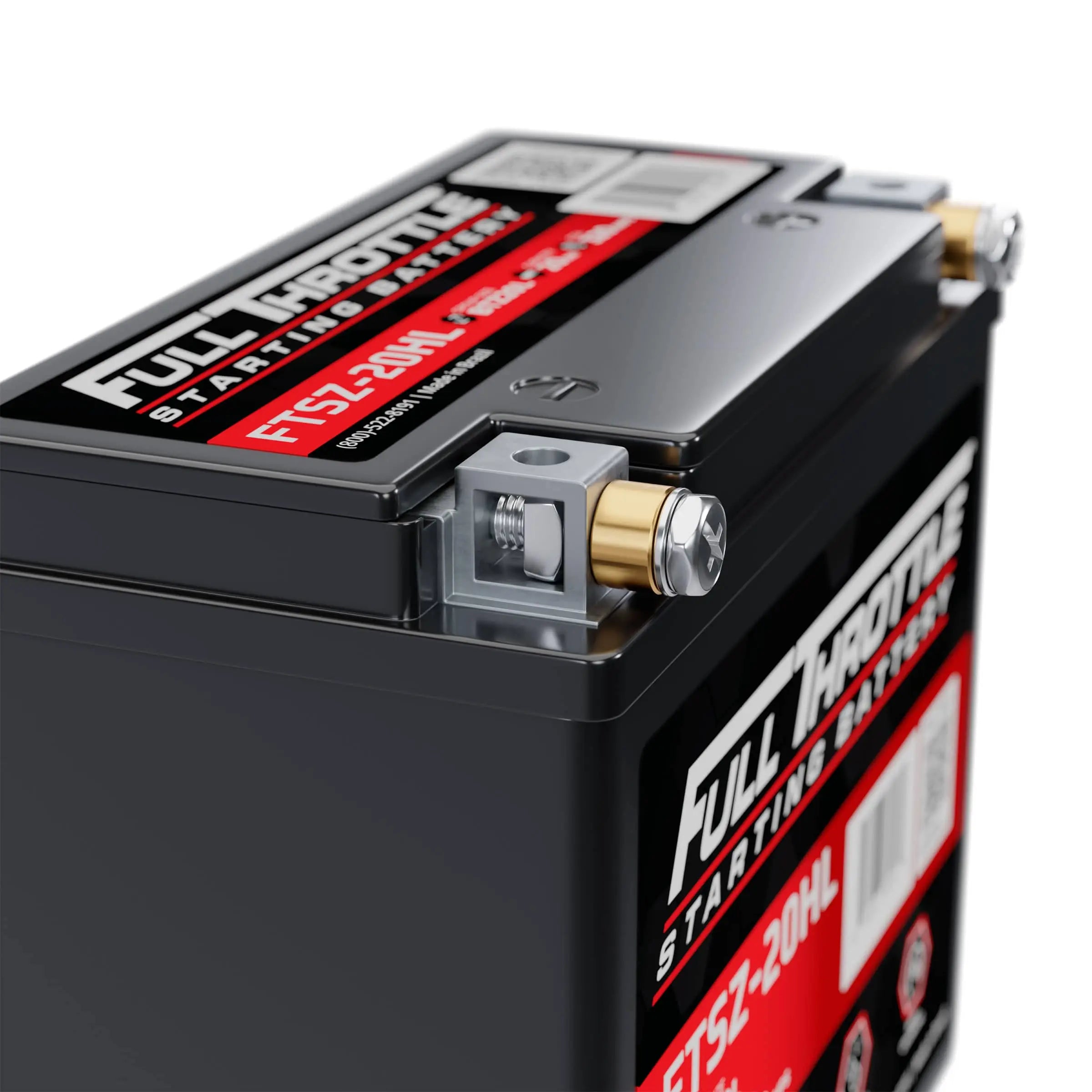 Close-up of a black Full Throttle car battery with red and white labeling, showing terminal connectors and model number FT5L-20HL.