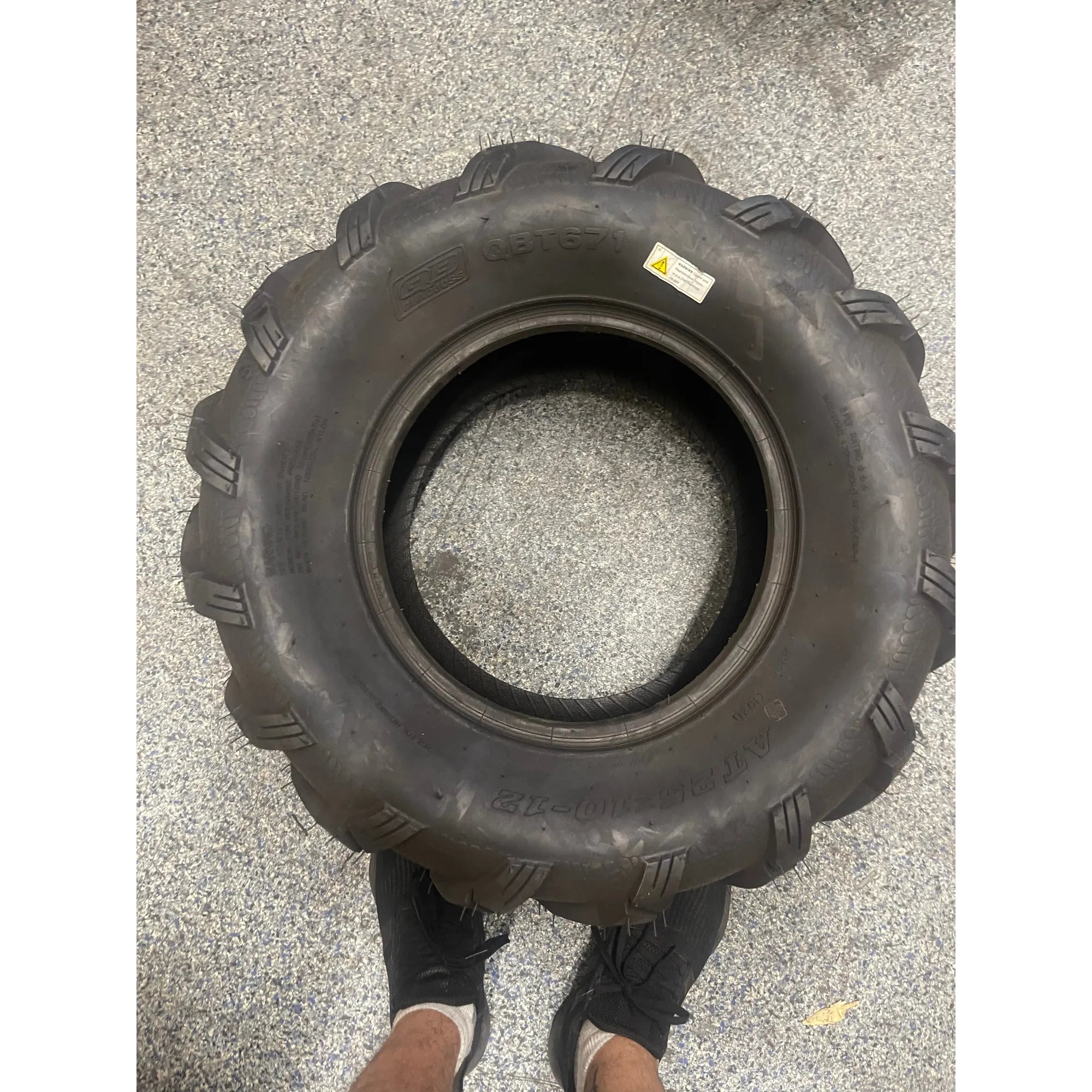 QBT671 Tire 25x10 R12 (GARAGE SALE)